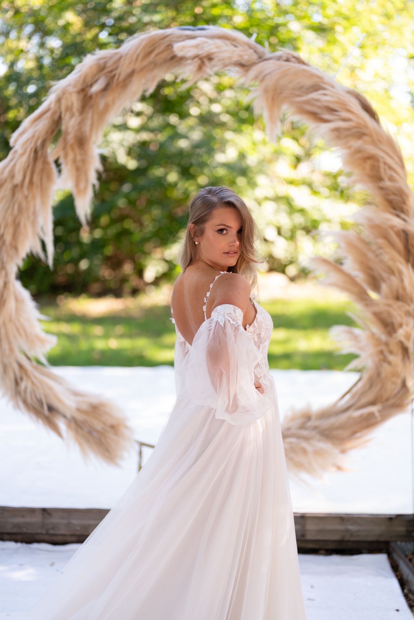 Beautiful bride on white wedding dress