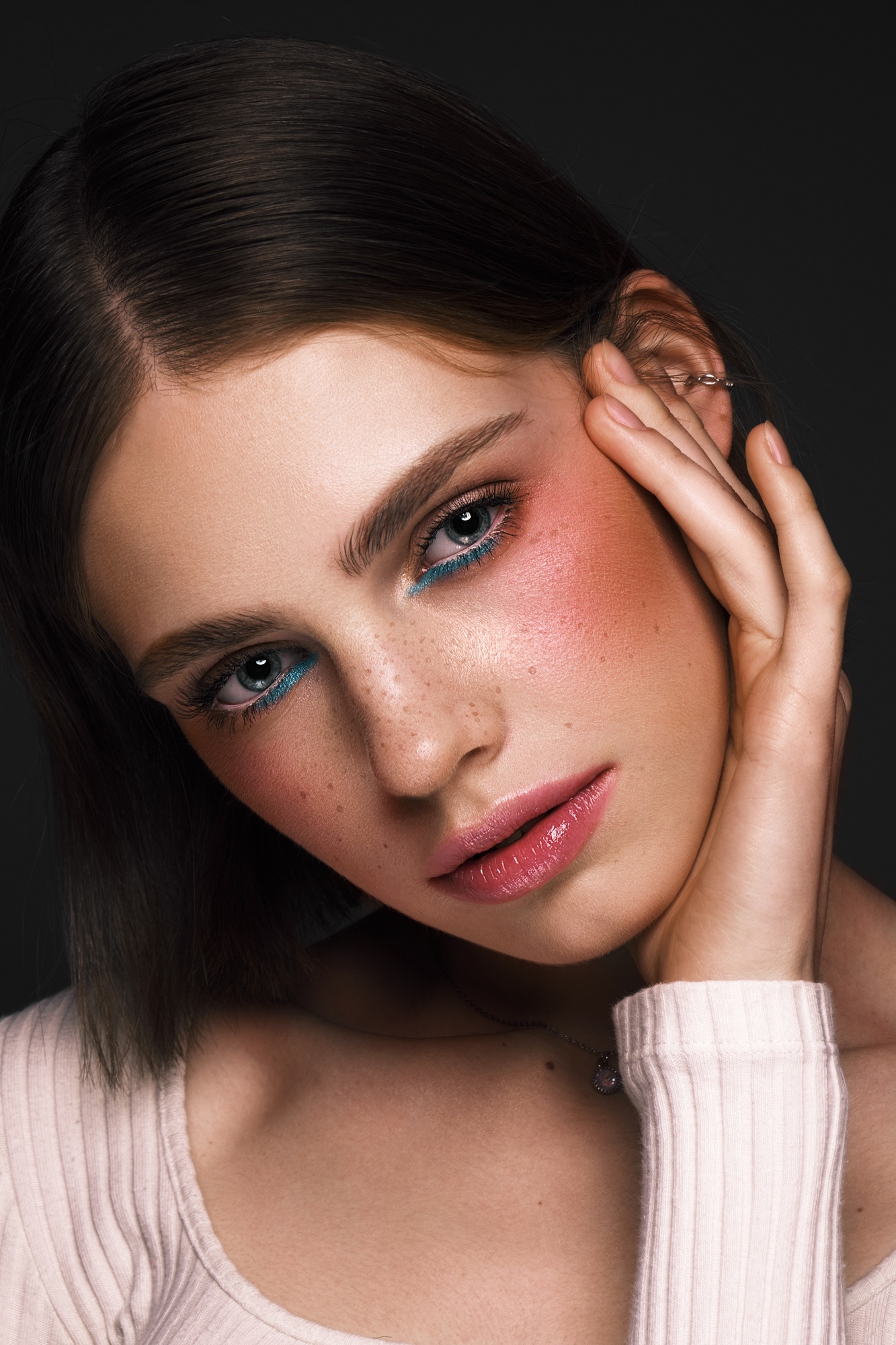 Beautiful girl with creative colorful makeup. Beauty face.