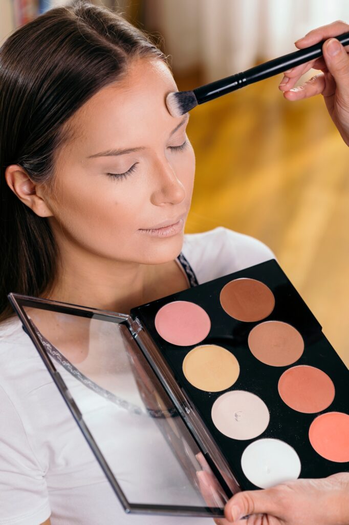 Make up artist working in a studio